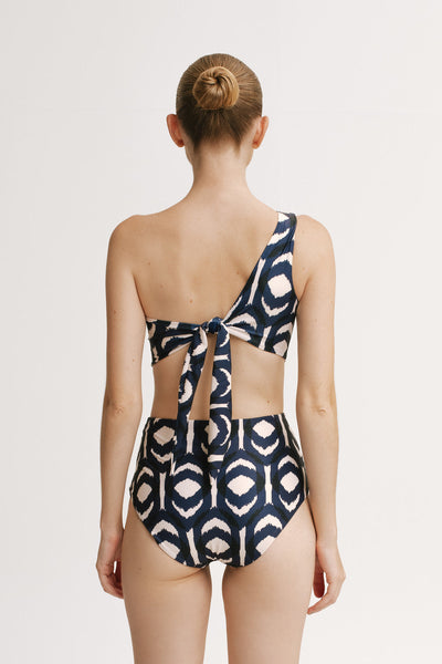 Back view of Sabrina Ikat One Piece with tie-back strap.