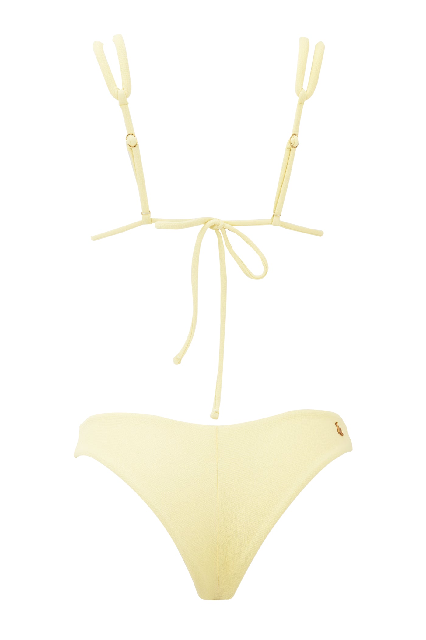 Yellow bikini set with thin straps on a white background