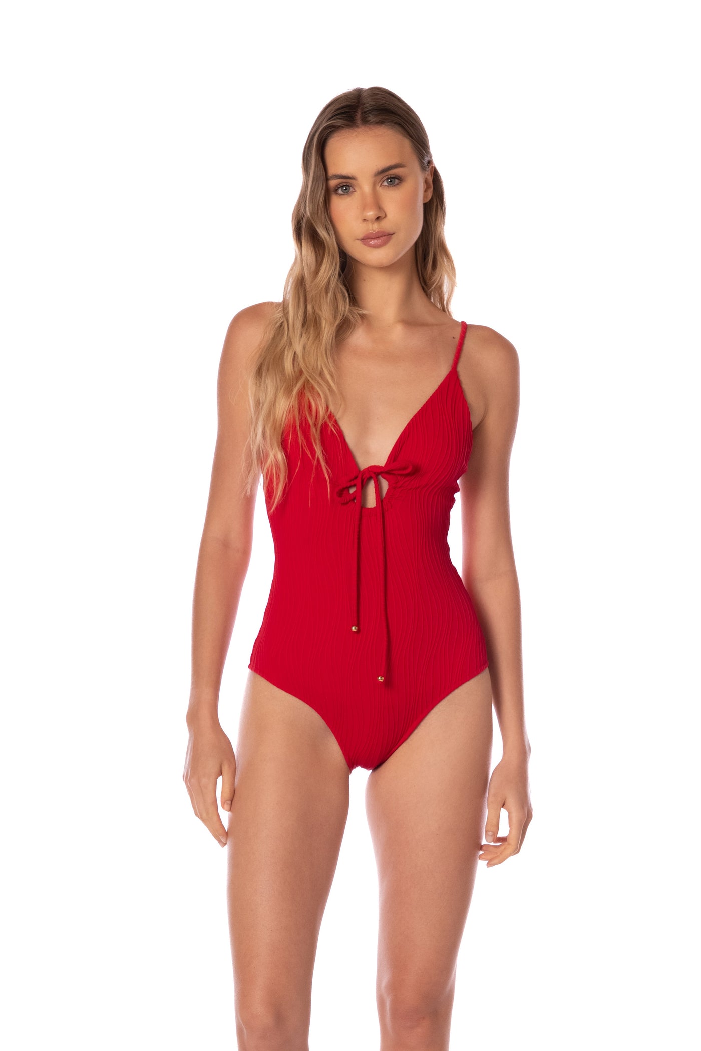Woman wearing a red swimsuit on a white background