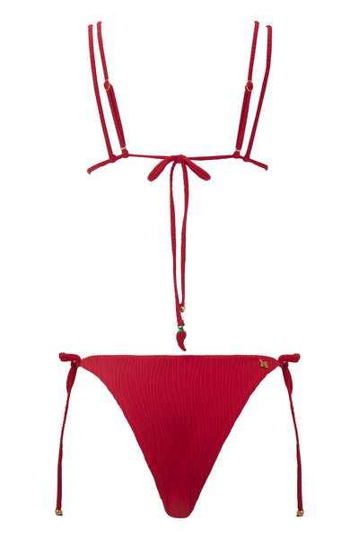 Red bikini set with thin straps on a white background