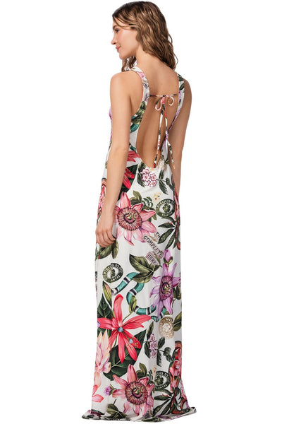 Woman wearing a floral dress with a white background