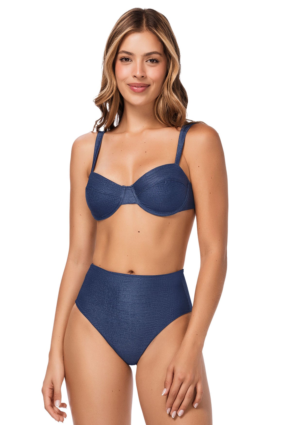High-waisted bikini bottom in dark blue textured shimmer fabric, made from eco-friendly materials with moderate back coverage. Model wears size small. Top and bottom sold separately.