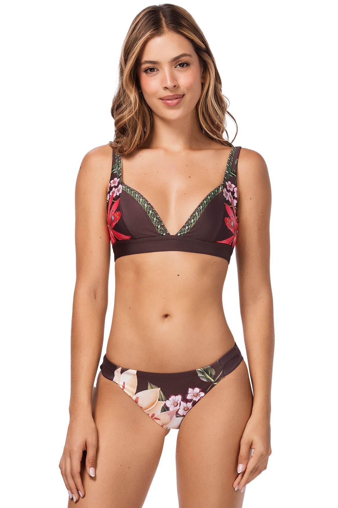 Woman wearing a floral bikini set on a white background